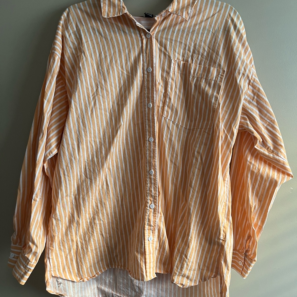 orange button down